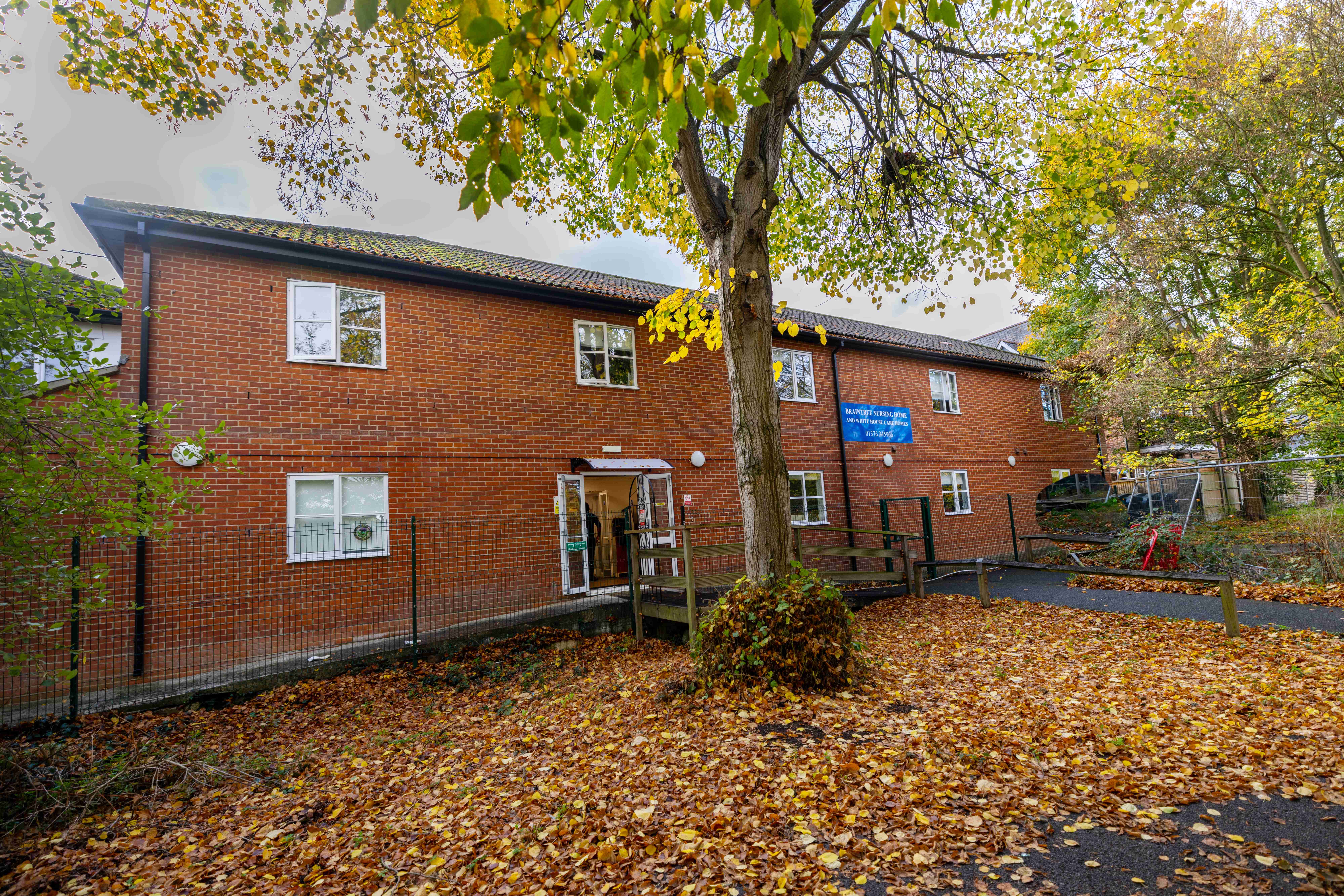 Red brick building in autumn
