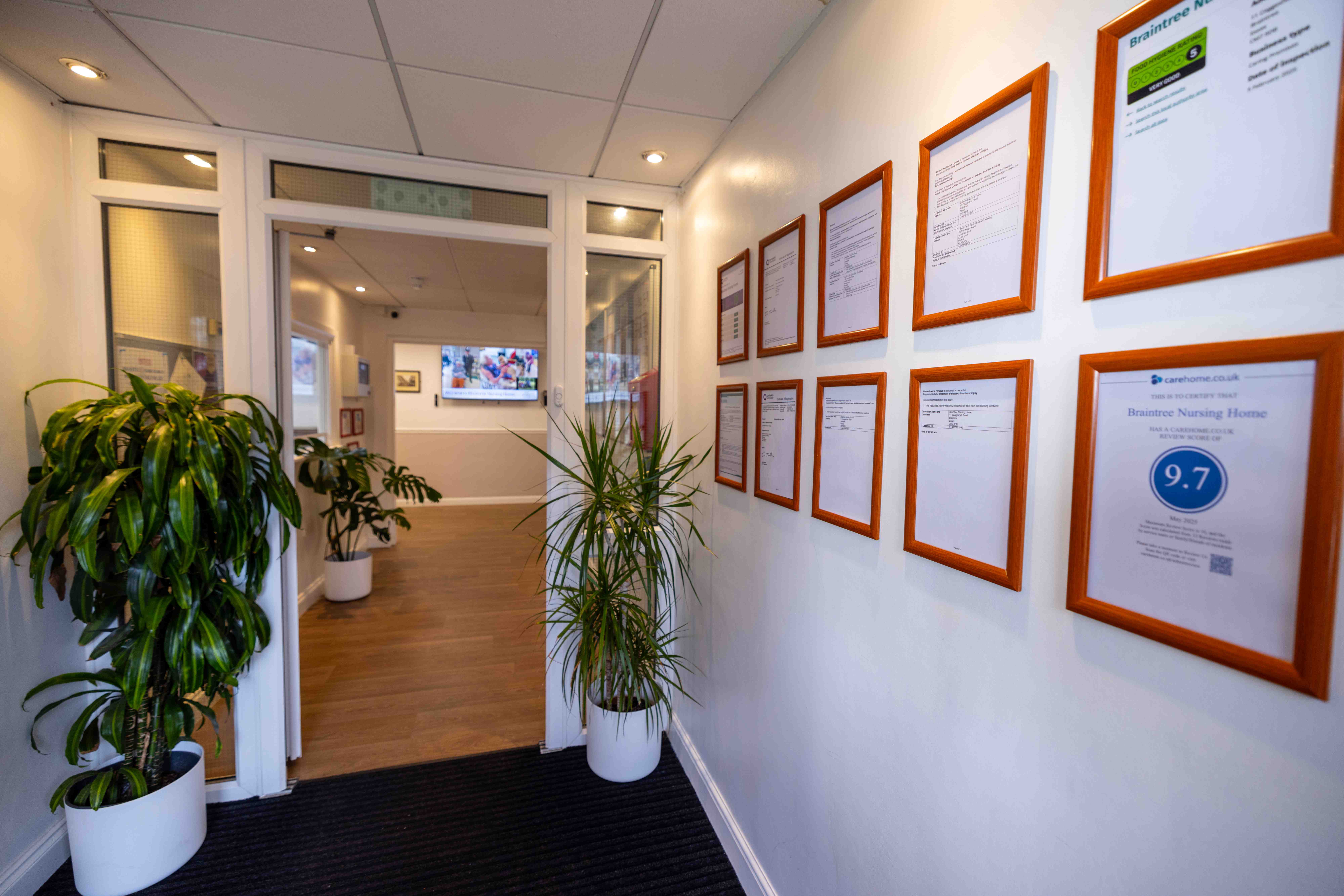 Entrance hallway with certificates and awards